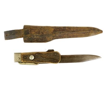 A Late 19th Century Folding Bowie Knife by J A Henckels of Solingen, the 18cm clip-point folding steel blade stamped at the r