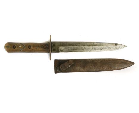 A Second World War Italian Fighting Knife, the 20.5cm single edge steel blade double edged for the last 8cm, with elliptical 