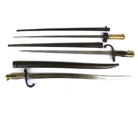 A French M1866 Chassepot Yataghan Sword Bayonet, the T section steel blade, crossguard and scabbard with no visible markings;