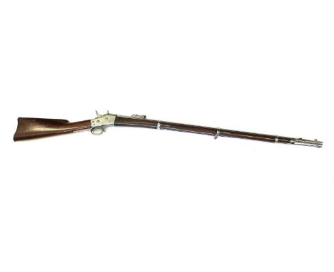 A Swedish Issue Remington Model 1867 Rolling Block Rifle, .50 calibre, the 95cm round steel barrel with hinged ladder rear si