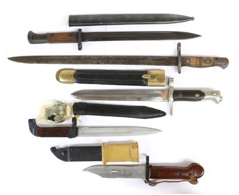 An Italian Model 1871/87 Vetterli-Vitali Shortened Bayonet, the blade stamped TERNI, with brass mounted leather scabbard; a C