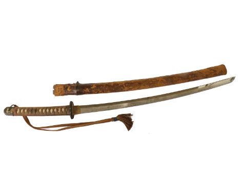 A Second World War Japanese Shin Gunto Katana, the 67cm steel blade with undulating hamon, the one-piece brass habaki with di