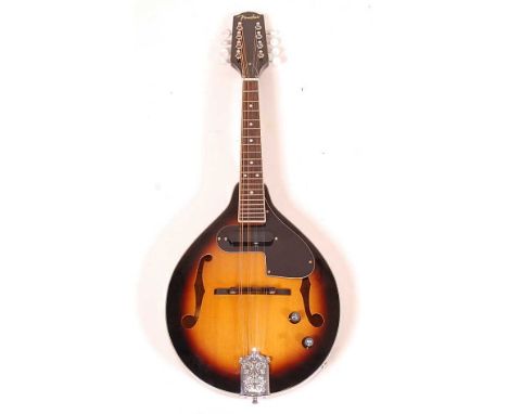 A Fender FM-52E mandolin, in sunburst finish with mother of pearl pegs, serial no. CD11070109, in soft carry case.Condition r
