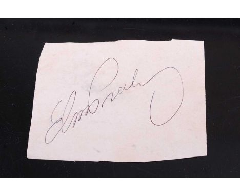 Elvis Presley, autograph in black ink on paper, together with a typed letter of provenance from Judy White, employee at The L