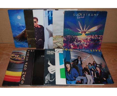 A collection of assorted 12" vinyl, various dates and genres to include Paul McCartney &amp; Wings - Wings over America, John