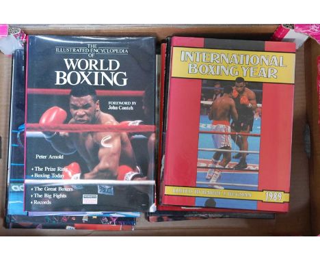 Four boxes of miscellaneous boxing related books, to include Lenny McLean's The Governor, Roy Shaw's Pretty Boy, John Harding