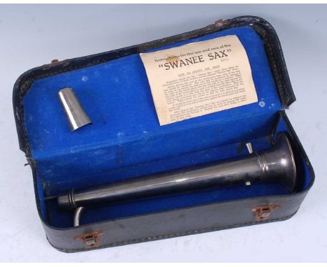 An early 20th century Swanee-Sax, Model B, Patent No.277221/27, in leather case with instruction leaflet (lacking mouthpiece)