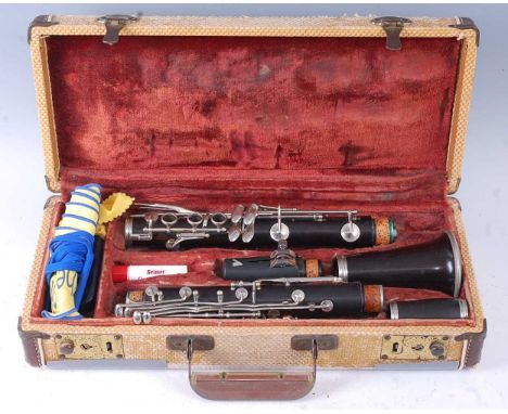 A Boosey &amp; Hawkes clarinet, The Edgware model, serial no.106759, in fitted case with accessories to include a folding sta