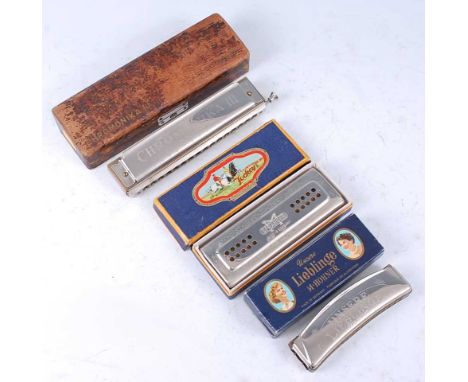 A Hohner Chromonika III harmonica in original case, together with a Hohner Unsere Lieblinge hamonica and an M. Spranger harmo