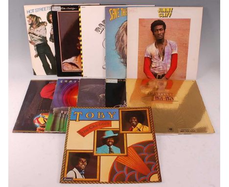 A collection of 12" vinyl, various dates and genres to include Electric Light Orchestra - Discovery, Earth, Wind &amp; Fire -