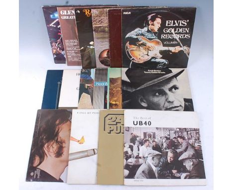 A collection of sixteen LP's to include John Lennon - Imagine, Paul McCartney - Pipes of Peace, Deep Purple - 24 Carat Purple