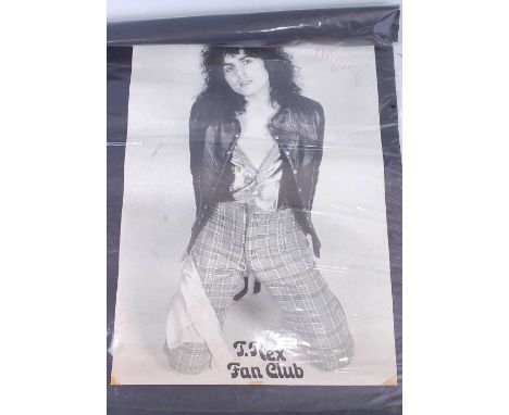 A Marc Bolan fan club poster, signed top right in red ink "Marc Bolan x", 64 x 44cm.The vendor states that the poster was sig