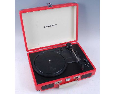 A modern Crosley Model CR8005A-OR portable turntable, w.35, d.26, h,12cm.