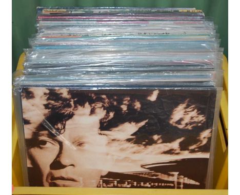 A collection of assorted 12" vinyl, various dates and genres, to include Steve Winwood - The Best Of, Arc of the Diver and Ba