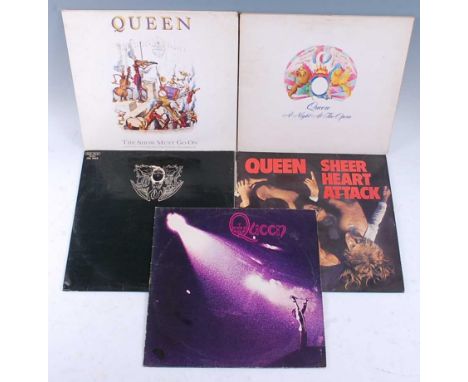 A collection of five Queen vinyl records to include Queen, Queen 1973 EMI 3006, Queen II EMI 767, Sheer Heart Attack, EMI 306