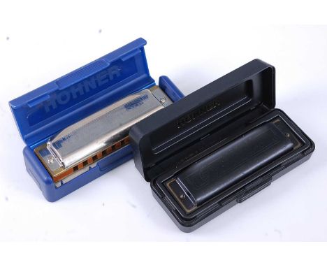 A Hohner Pro Harp B MS Series harmonica, cased, together with a Hohner Blues Harp MS Series harmonica, cased. (2)