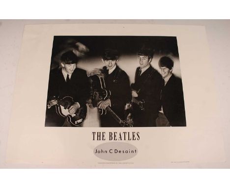 The Beatles, a black and white poster of The Beatles Royal Command Performance 1963, after the photograph by John C. Desaint,