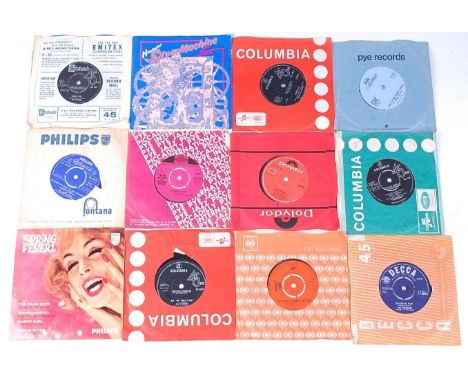 A collection of 7" singles and EP's to include The Beatles - I Feel Fine and Ticket to Ride, Carly Simon - You're So Vain, Th