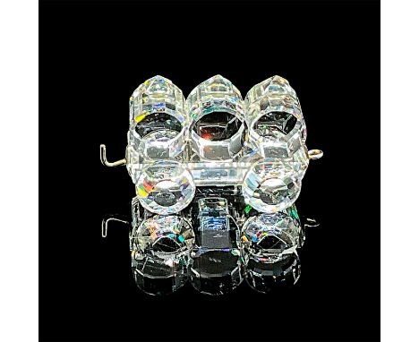Dazzling clear cut crystal figure of a train car with three barrels on top. Item number A 7471 NR 000 004. Swarovski etched m