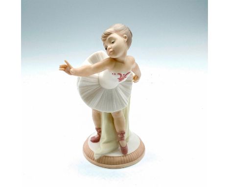 Depicts a young ballerina performing ballet. Matte finish; Golden Memories backstamp. Item has its original box which measure