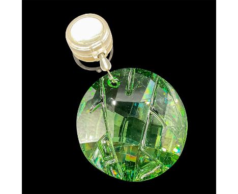 Lead green crystal window ornament, with retractable wire, given to renewing members and those joining SCS. Swarovski etched 