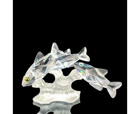 This retired figurine was part of the "South Sea" group. Depicts three south sea lead crystal fish swimming around frosted co