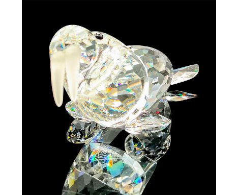 Part of the Kingdom of Ice and Snow theme group. Lead crystal adorable walrus laying down, made with frosted crystal tusks. S