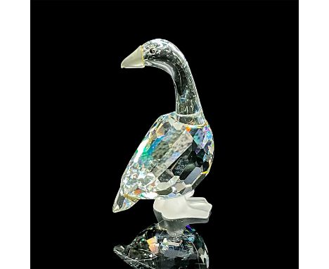 Brilliant clear cut crystal figure of a goose with satin beak and feet. Swarovski etched mark. Includes original box, 4.75"H 