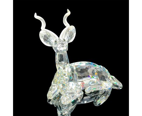 Part of the Inspiration Africa trilogy. Annual edition lead crystal seated figure with frosted twisted horns made from facete