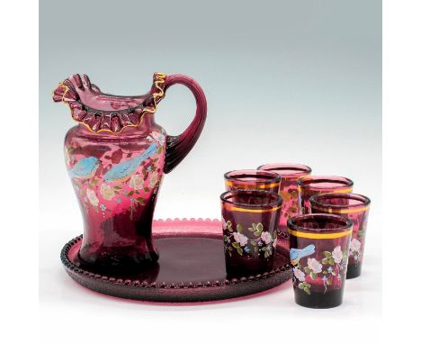 Beautiful glass pitcher set with a hand painted floral motif. Gold rimmed pitcher and gold banded glasses on a matching minia