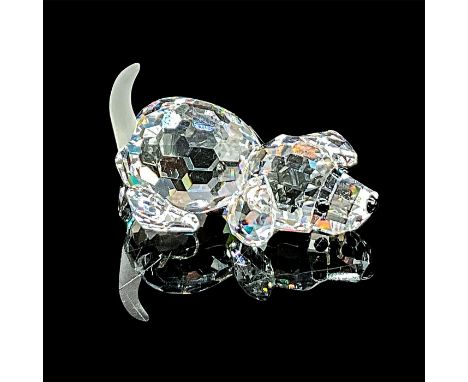 Dazzling clear cut crystal figure of a puppy with black eyes and nose. Item 172296. Swarovski etched mark. Certificate of Aut