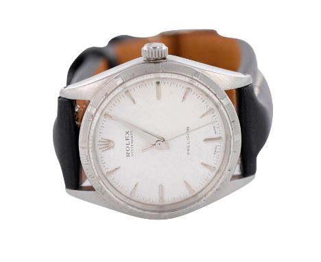 Model 1003. Serial 1477758. Stainless steel with white face. Original case, dial, bezel and crown. Aftermarket movement. Swis