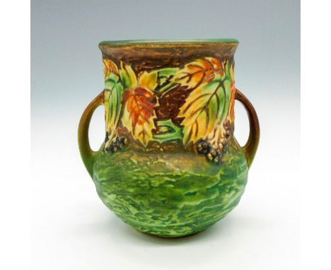 Light glaze over green and brown body. Raised blackberry design. Dimensions: 5"L x 4"W x 5"HManufacturer: Roseville PotteryCo