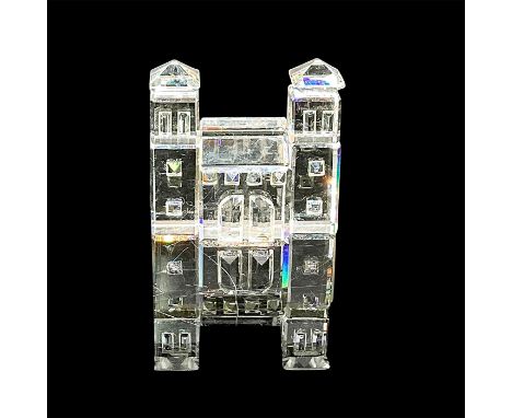 Sparkling clear cut crystal figure of a building with two towers. Swarovski etched mark. Includes original box, 3.75"H x 3.25