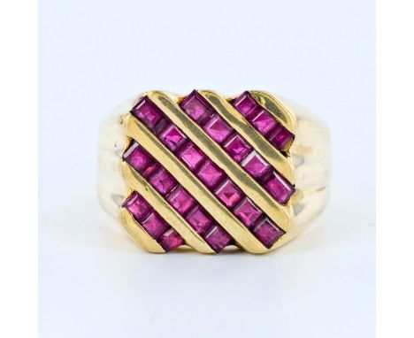 Finely made geometric design gentleman's ring in 18K yellow gold with 1ct rubies. Weight 8.5 grams. Size 8-8.5. Marked 18K V1