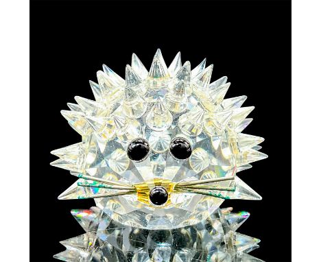 Lead crystal adorable figure with spikes and silver metal whiskers. Swarovski etched backstamp. This item has its original bo