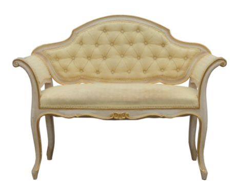 White painted and gilt window seat, 20th Century, with scroll ends, on cabriole legs, with yellow upholstery, 85cm high x 111