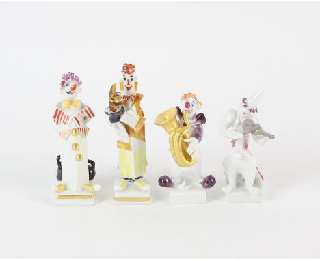 Meissen clowns, two band players from the circus band modelled by Peter Strang, tuba and violin, and two other figures of clo