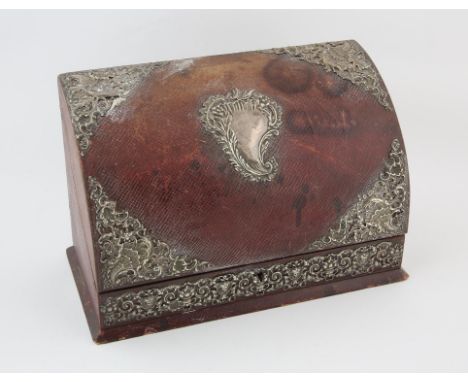 Red Morocco and silver mounted stationery box, the silver embossed with shells, masks and scrolls by Goldsmiths & Silversmith