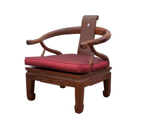Chinese hardwood armchair, 20th Century, with scroll end splat and horse shoe back, above red silk cushion, on square legs, 8