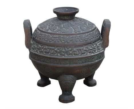 A Chinese archaic style bronzed metal food serving vessel, 20th Century, 27cm high. Provenance: From Munstead Wood. The conte
