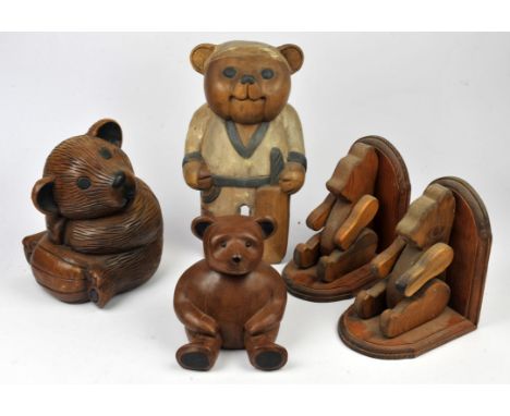Pair of articulated bear bookends and three other carved wood bear figures.(5)Provenance: From Munstead Wood. The contents of