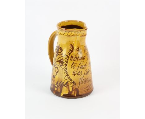 Mary Wondrausch, yellow and brown glazed jug, " In the morning I awoke to find my garden was full of flowers", H 18.5cm (with
