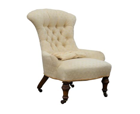 Victorian walnut nursing chair, with yellow button back upholstery, 81cm high. Provenance: From Munstead Wood. The contents o