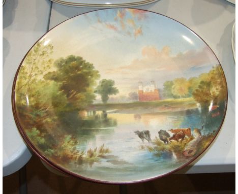 A 19th century painted circular wall plaque 'Eton College', 39.5cm diameter, impressed 'Minton' to base, (spider crack) and a