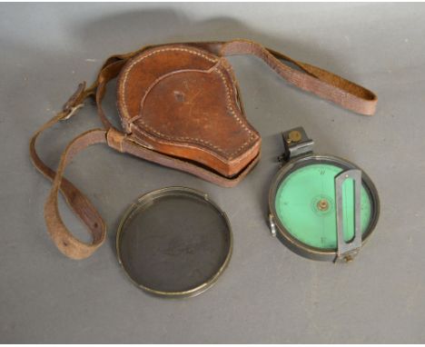 A 19th Century Brass Compass by Troughton & Sims, London, with green card dial and folding side vein within original leather 