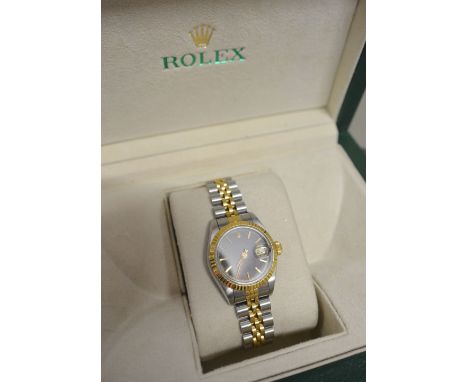 A Rolex Oyster Perpetual Date Adjust Superlative Chronometer Gold and Stainless Steel Ladies Wrist Watch with Blue Dial, with
