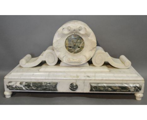 A 19th Century French Variegated Marble Mantle Clock, the green variegated marble face with Arabic numerals and two train mov