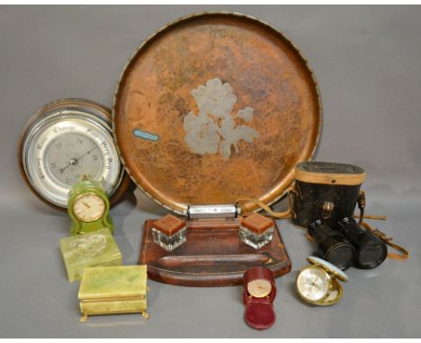 A Beaten Copper and Pewter Circular Tray by Harold Holmes together with a leather desk set, a cased pair of binoculars, two o