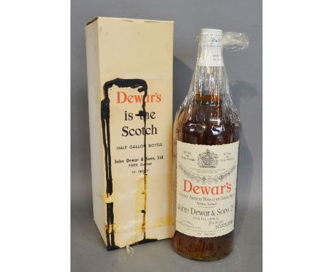 A Dewar's Half Gallon Bottle of Finest Scotch Whisky of Great Age, White Label, 70% Proof, within original cellophane and box